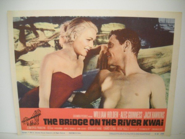 LOBBY CARD: LOBBY CARD - THE BRIDGE ON THE RIVER KWAI WITH WILLIAM HOLDEN, ALEC GUINNESS, JACK HAWKINS. 1963. USED CONDITION.