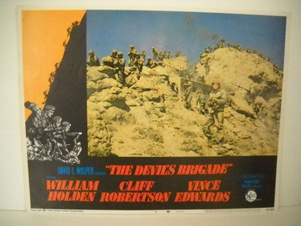 LOBBY CARD: LOBBY CARD - THE DEVIL'S BRIGADE WITH WILLIAM HOLDEN, CLIFF ROBERTSON, VINCE EDWARDS. 1968. USED CONDITION; SCUFFED. 14 INCHES WIDE X 11 INCHES HIGH.