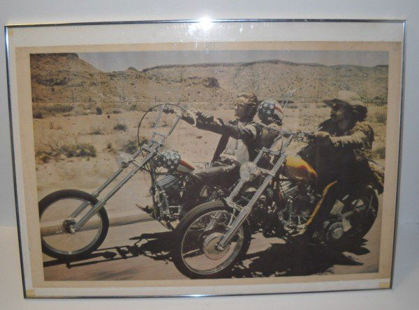 MOVIE POSTER: 1960'S EASY RIDER WITH PETER FONDA & DENNIS HOPPER POSTER. PIN HOLES. 23 INCHES X 35 INCHES.