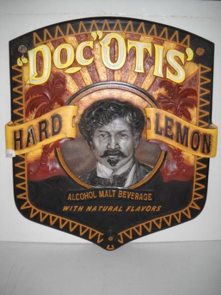 ADVERTISING SIGNS: DOC OTIS' HARD LEMONADE ALCOHOL MALT BEVERAGE FOAM ADVERTISING SIGN. 30 INCHES X 27 INCHES