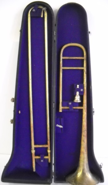 TROMBONE: TROMBONE MARKED ROYAL WITH CASE. WEAR; USED CONDITION; DENTS. 36 INCHES X 10 INCHES