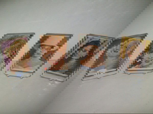 TABLE MIRRORS: 4 TABLE MIRROROS WITH HOLLYWOOD WOMAN PRINTS. METAL RUST. 4 INCHES X 6 INCHES.