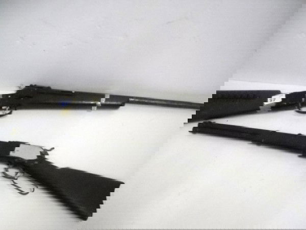 CAP GUNS: 2 TOY CAP GUNS INCLUDING COLT & WINCHESTER BY MATTEL. USED CONDITION. TAPE ON STOCK, NOT EXAMINED WITHOUT TAPE. 31 INCHES LONG