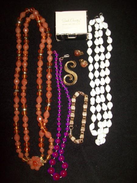 COSTUME JEWELRY: "S" PIN MARKED MAMSELLE; SARAH COV. BRACELET, & WHITE NECKLACE; MADE IN WESTERN GERMANY ORANGE NECKLACE; TRIFARI EARRINGS; PURPLE NECKLACE MARKED HUNUK??; SARAH COVENTRY BOX ONLY.