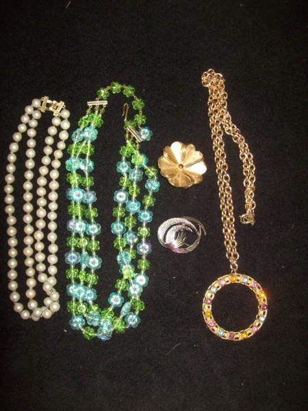 COSTUME JEWELRY: GOLED TONED PIN MARKED TRIFARI; SARAH COV. SILVER TONED PIN; GREEN/BLUE FLORAL NECKLACE MARKED W. GERMANY; PEARLS MARKED MARVELLA; SARAH COV. NECKLACE WITH LARGE CHARM.