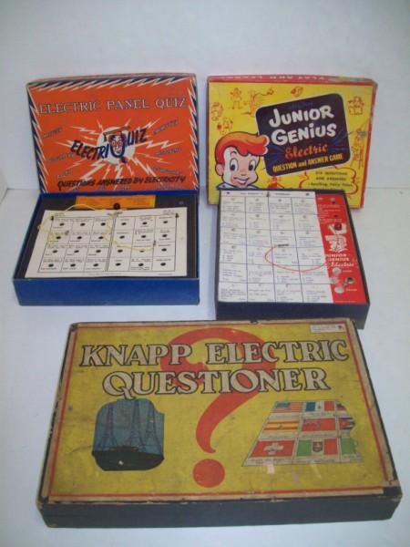 GAMES: 3 ELECTRIC GAMES INCLUDING ELECTRIC QUIZ PANEL; JUNIOR GENIUS ELECTRIC GAME; KNAPP ELECTRIC QUESTIONER. USED CONDITION; STAINED; BOX TORN. 10 INCHES X 14 INCHES.