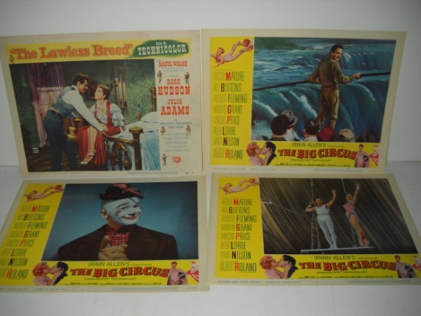 LOBBY CARDS: 4 LOBBY CARDS/POSTERS INCLUDING 3 THE BIG CIRCUS - RED BUTTONS, VICTOR MATURE, VINCENT PRICE, PETER LORRE; THE LAWLESS BEED - RAOUL WALSH, ROCK HUDSON, JULIA ADAMS. USED CONDITION. 14 INCHES X 11 INCH