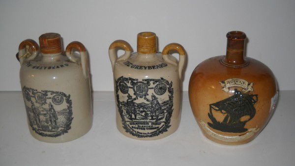 BOTTLES: COLLECTION OF3 LIQUOR BOTTLES INCLUDING 2 HEATHER DEW BLENDED SCOTCH WHISKEY; SPECIAL HIGHLAND WHISKY. USED CONDITION; CHIPS; STAINS. LARGEST MEASURES 8 INCHES HIGH. All property is sold "AS IS", "WHE