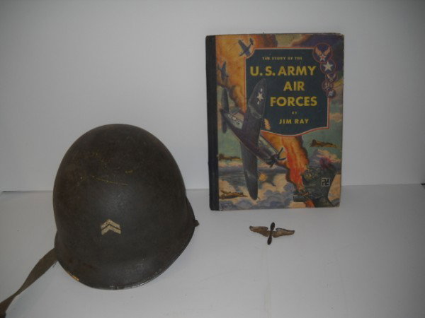 MILITARY ITEMS: MILITARY ITEMS INCLUDING HELMET; PIN; U.S. ARMY AIR FORCES BY JIM RAY. SCRATCHES; DENTS; FOXING; USED CONDITION. 12 INCHES X 9 1/2 INCHES. All property is sold "AS IS", "WHERE IS", and ALL SALES ARE F