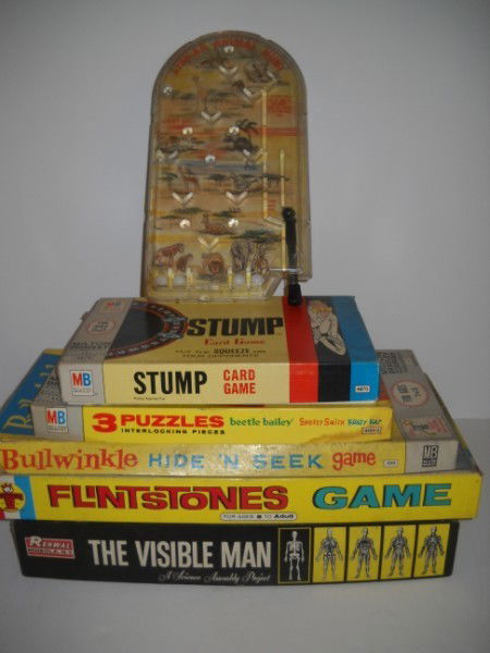 GAMES: VARIOUS GAMES INCLUDING AMERICAN ANIMAL HUNT TABLE TOP PINBALL MACHINE; BEATLE BAILEY 3 PUZZLES; STUMP CARD GAME; BULLWINKLE HIDE 'N SEEK GAME; FLINTSTONES; ALSO THE VISIBLE MAN MODEL KIT. USED CONDIT