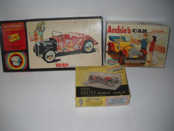 MODEL KITS: 3 MODEL KITS INCLUDING ARCHIE'S CAR; FLOWER CAR; STUTZ BEARCAT. POSSILBE NOT COMPLETE. LARGEST MEASURES 13 1/2 INCHES X 7 INCHES. All property is sold "AS IS", "WHERE IS", and ALL SALES ARE FINAL. The