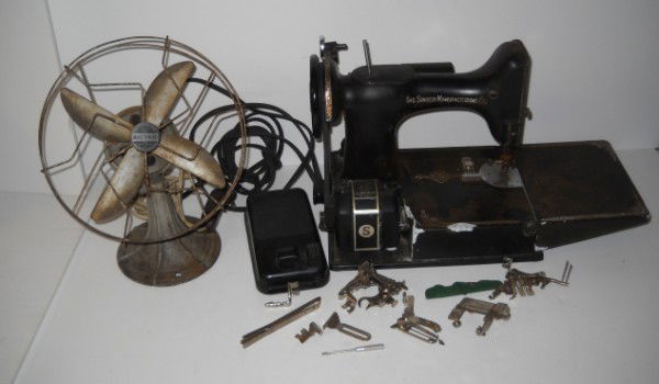 SEWING MACHINE/ FAN: MARCH WIND METAL FAN; SINGER SEWING MACHINE WITH CASE. CASE BOTTOM IS NOT ATTACHED; RUST; SCRATCHES; STAINS. USED CONDITION. All property is sold "AS IS", "WHERE IS", and ALL SALES ARE FINAL. There ar