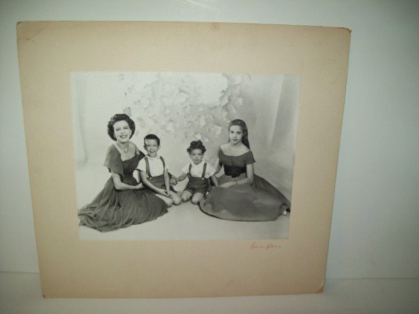 PHOTO: FAMILY PORTRAIT PHOTO BY CECIL BEATON. STAMP ON BACK. STAINS TO MATTE; CORNERS BENT. 12 1/2 INCHES X 13 1/2 INCHES. All property is sold "AS IS", "WHERE IS", and ALL SALES ARE FINAL. There are NO REFU
