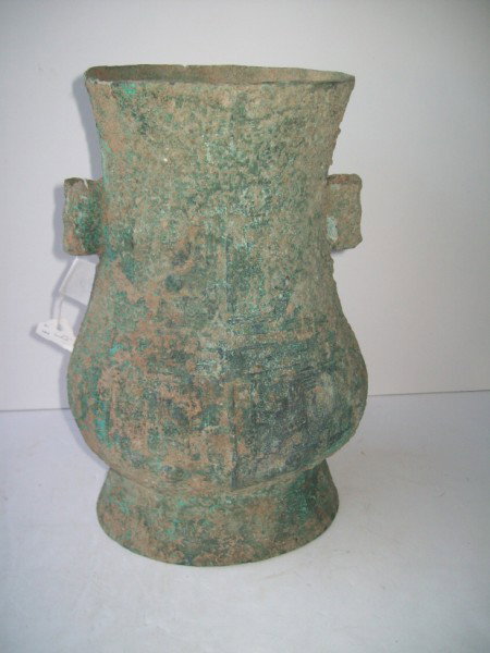 ARTIFACT: DUG UP ANCIENT CHINESE ARTIFACT VASE. HOLES; RUST. 12 INCHES X 9 INCHES. All property is sold "AS IS", "WHERE IS", and ALL SALES ARE FINAL. There are NO REFUNDS, NO EXCHANGES. ALL ARTWORK, PAINTINGS, 
