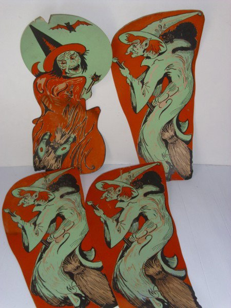 HALLOWEEN DECORATIONS: 4 WITH HALLOWEEN CARDBOARD DECORATIONS. STAINED; TEARS; TAPED. 18 1/2 INCHES HIGH X 8 1/2 INCHES WIDE. All property is sold "AS IS", "WHERE IS", and ALL SALES ARE FINAL. There are NO REFUNDS, NO EXCHA
