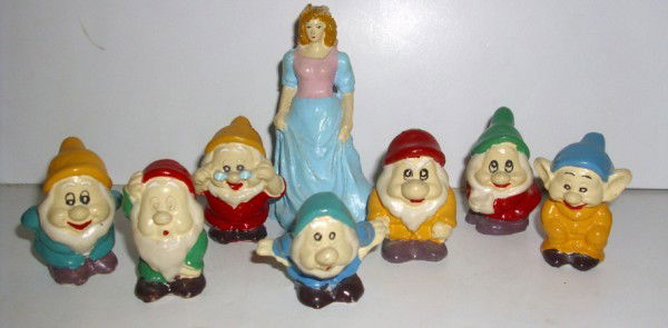 SNOW WHITE: SNOW WHITE & THE 7 DWARFS COMPOSITE FIGURES. PAINT LOSS; SCRATCHES. 3 1/2 INCHES HIGH X 2 INCHES WIDE. PLEASE CONTACT AUCTION HALL REGARDING COMPLETE CONDITION REPORT PRIOR TO BIDDING. All property is