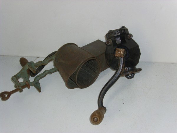 GRINDERS: REGINA GRINDER; ARCADE COFFEE GRINDER. NOT COMPLETE; USED CONDITION. 13 1/2 INCHES HIGH PLEASE CONTACT AUCTION HALL REGARDING COMPLETE CONDITION REPORT PRIOR TO BIDDING. All property is sold "AS IS", 