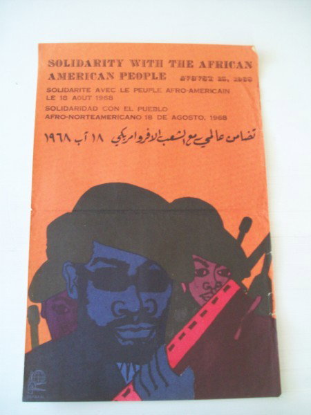 PROPAGANDA POSTER: PROPAGANDA POSTER BY OSPAAAL. CREASES; EDGE TEARS; USED CONDITION. 21 INCHES X 13 INCHES. PLEASE CONTACT AUCTION HALL REGARDING COMPLETE CONDITION REPORT PRIOR TO BIDDING. All property is sold "AS IS"