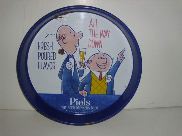 BEER ADVERTISING: 1957 PIELS BEER ADVERTISING SERVING TRAY. RUST; PAINT LOSS; SCRATCHES. 13 INCHES DIAM. All property is sold "AS IS", "WHERE IS", and ALL SALES ARE FINAL. There are NO REFUNDS, NO EXCHANGES. ALL ARTWOR