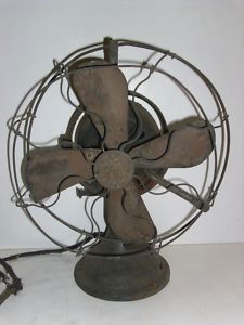 BRASS BLADE FAN: VINTAGE GE (GENERAL ELECTRIC) BRASS BLADE FAN. CAN NOT READ THE SERIAL NUMBER. WIRE IS FRAYED, NEEDS TO BE RE-WIRED; RUST ON BASE; MISSING SWITCH; BACK NEEDS REPAIR; NEEDS CLEANING; BOTTOM OF CAGE NEE