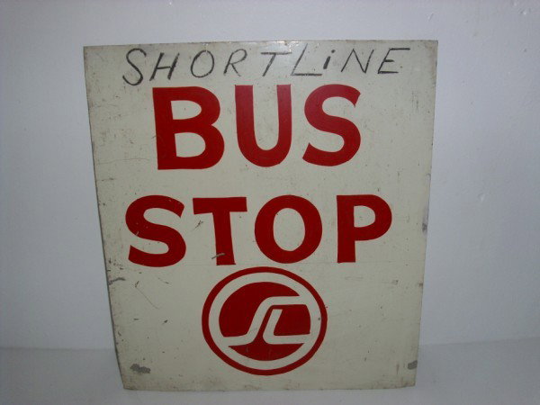 PORCELAIN SIGN: DOUBLE SIDED PORCELAIN BUS STOP SIGN. WRITTEN ON; PORCELAIN LOSS; SCRATCHES; STAINS. 14 INCHES WIDE X 16 INCHES HIGH. All property is sold "AS IS", "WHERE IS", and ALL SALES ARE FINAL. There are NO RE