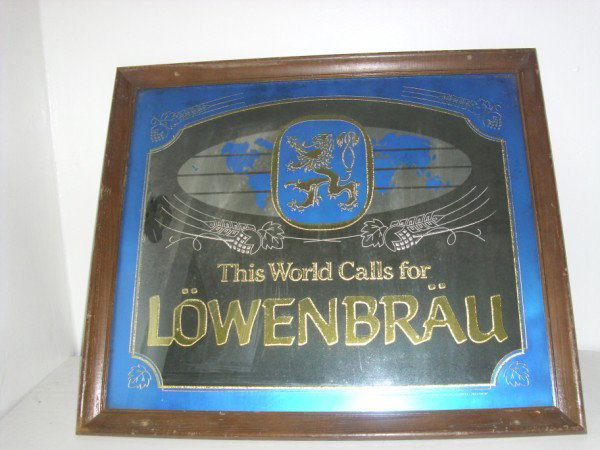 BEER ADVERTISING MIRROR: LOWENBRAU BEER ADVERTISING MIRROR. SCRATCHES. 22 1/2 INCHES X 22 INCHES. All property is sold "AS IS", "WHERE IS", and ALL SALES ARE FINAL. There are NO REFUNDS, NO EXCHANGES. ALL ARTWORK, PAINTINGS, 