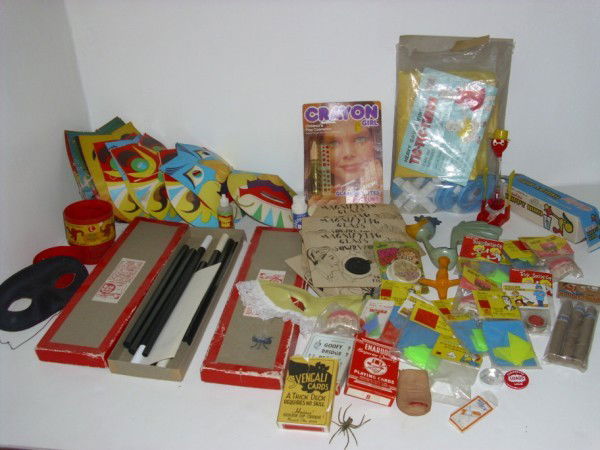 TOYS: COLLECTION OF NOVELTY TOYS INCLUDING TRICK SUCTION CUP; NAIL TRICK; MAGNIFYING GLASS SQUIRT TOY; VANISHING WAND. USED CONDITION. All property is sold "AS IS", "WHERE IS", and ALL SALES ARE FINAL. Ther