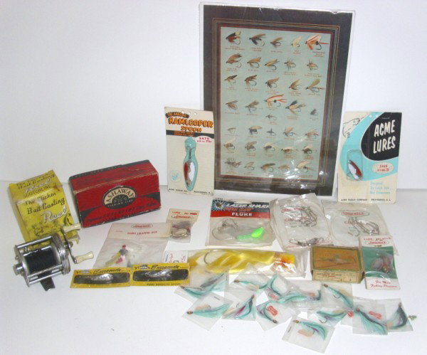 FISHING LOT: FISHING ITEMS INCLUDING LURES; HOOKS; ASHAWAY FISHING LINE; THE CLICKER BAIT CASTING REEL. JORGENSEN DART CRAPPIE JIGS; ABERDEEN PELICAN FISH HOOKS; FLUKE.