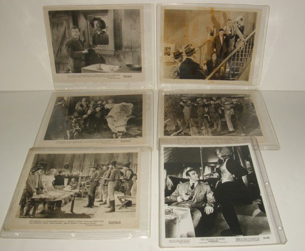 PHOTOS: 6 MOVIE LOBBY CARD PHOTOS INCLUDING LEO GORCEY & THE BOWREY BOYS; GOLDFINGER. STAINED; CREASES. 10 INCHES X 8 1/2 INCHES.