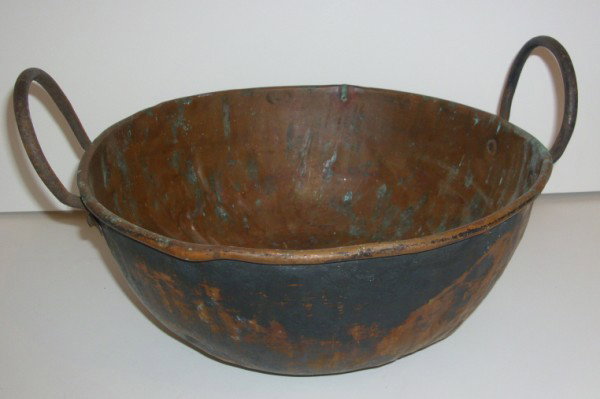 COPPER BOWL: 19TH C. COPPER CANDY BOWL WITH SIDE HANDLES. 14 INCHES X 7 1/2 INCHES.
