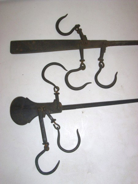 SCALES: 2 BEAM SCALES INCLUDING 1 MARKED W.H. TALLMADGE W.H. RANTED?. USED CONDITION. 21 1/2 INCHES LONG.