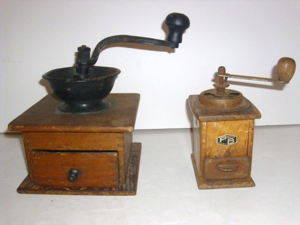 COFFEE GRINDERS: 2 COFFEE GRINDERS 1 MARKEDP B MACINA ACCIAIO. USED CONDITION. 10 INCHES HIGH INCLUDING HANDLE X 9 INCHES WIDE.