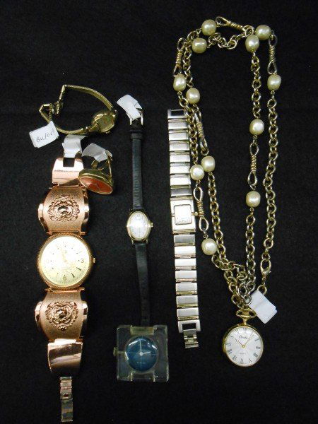 7 WATCHES: 7 WATCHES: 1 RING WATCH MARKED "ENDURA"; 1 NECKLACE WATCH MARKED "CAROLEE"; 4 WRIST WATCHES MARKED "TIMEX", "BULOVA", "VIVANI QUARTZ"; 1 WATCH FACE.