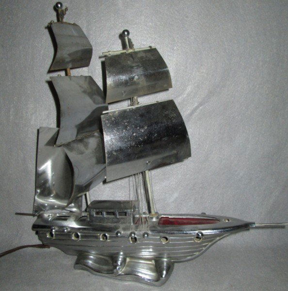 LAMP: CHROME SAILBOAT TELEVISION LAMP. NEEDS RE-WIRING. 16 INCHES X 17 1/2 INCHES.