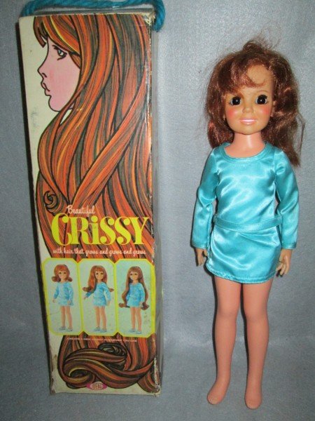 DOLL: BEAUTIFUL CRISSY DOLL BY IDEAL IN ORIGINAL BLUE DRESS & BOX. HAIR WORKS. DOLL IN MINT CONDITION, LACKING SHOES; BOX IN RUFF CONDITION. 19 INCHES HIGH.