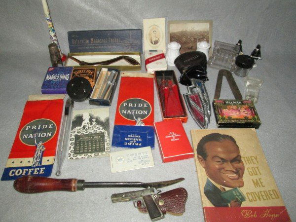 ASSORTED LOT: ASSORTED LOT INCLUDING TOY GUN; PRIDE NATION COFFEE BAGS; BOB HOPE "THEY GOT ME COVERED" BOOK; BATESVILLE MONSEAL CASKET HANDLE; PHOTOS; 1923 CALENDAR; SPODE SALT PEPPER SHAKER. USED CONDITION.