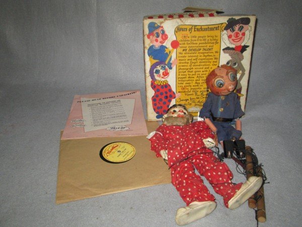 MARIONETTE: 2 MARIONETTES INCLUDING 1948 KILROY THE COP BY TALENTOON; & CLOWN. USED CONDITION; STRINGS TANGLED; PAINT LOSS; PIECES LACKING; BOX TORN, STAINED. 11 INCHES X 4 INCHES