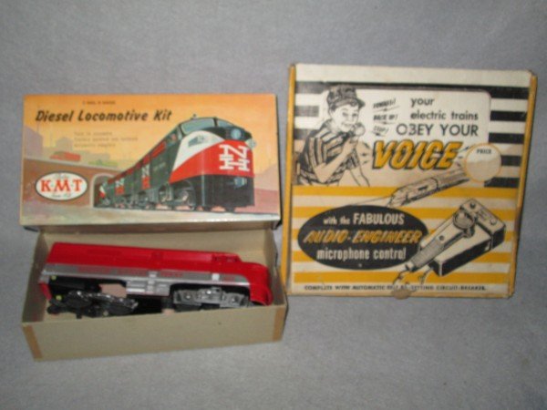 TOYS: 2 TOYS INCLUDING DIESEL LOCOMOTIVE MODEL KIT; AUDIO ENGINEER MICROPHONE CONTROLER. USED CONDITION; PIECES LACKING; PAMPHLETS GLUED TO BOX TOP. LARGEST MEASURES 11 INCHES X 10 1/2 INCHES.