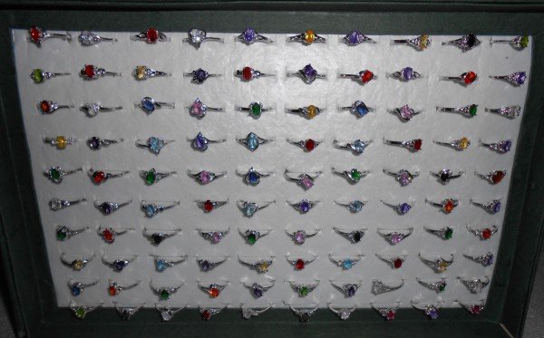 RINGS: 100 STERLING RINGS MARKED 925.