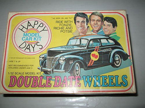 MODEL KIT: 1974 HAPPY DAYS DOUBLE DATE WHEELS 1/32 SCALE MODEL CAR KIT BY PALMER HOBBIES, NO. 7721. NOT COMPLETE. 3 INCHES X 9 INCHES.