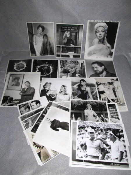 PHOTOS: COLLECTION OF 23 PRESS PHOTOS INCLUDING DONNA DOUGLAS; MARTA DANE; OTTO GRAHAM; VIOLET FUCHS; JOHN HOLMES; ARNOLD PALMER. USED CONDITION. LARGEST MEASURES 8 INCHES X 15 INCHES.