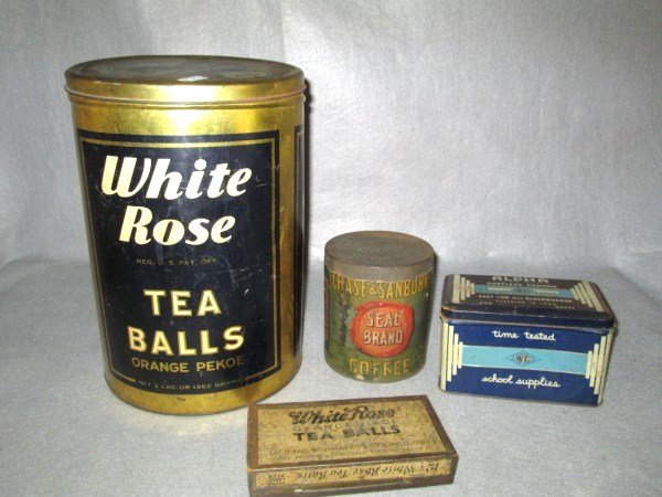 TINS: 4 ADVERTISING TINS INCLUDING LARGE WHITE ROSE TEA BALLS; CHASE & SANBURNS SEAL BRAND COFFEE; ALPHA DUSTLESS CRAYON. SCRATCHES; PAINT LOSS; DENTS. LARGEST MEASURES 12 INCHES X 8 INCHES.