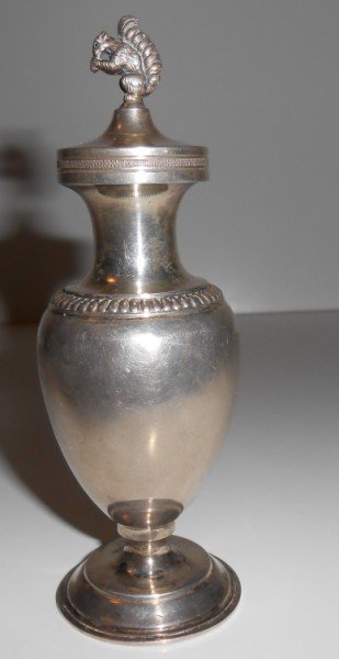 STERLING: STERLING 18TH C. SHAKER WITH SQUIRREL ON TOP. DENT. 5 INCHES X 2 INCHES.
