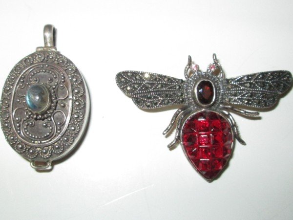 STERLING JEWELRY: 2 STERLING JEWELRY INCLUDING 1 BEE PIN/BROOCH; 1 PENDANT/CHARM PILL BOX . LARGEST MEASURES 2 INCHES X 1 1/2 INCHES.