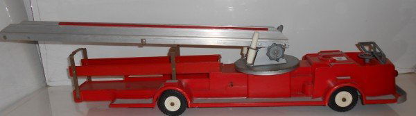 TOY: 1950'S IDEAL FIRE TRUCK. USED CONDITION; POSSIBLE MISSING PIECES. 34 INCHES X 8 INCHES X 6 1/2 INCHES.
