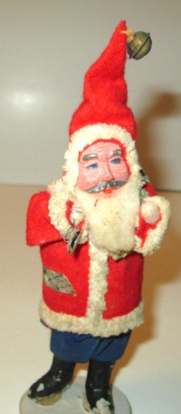 SANTA STATUE: VINTAGE MADE IN JAPAN SANTA CLAUS WITH PAPER MACHE FACE. USED CONDITION; WAIST AREA LOOSE. 7 INCHES X 2 INCHES.