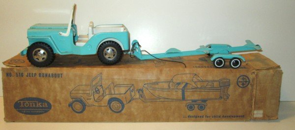 TOY: 1960'S TONKA NO. 516 JEEP RUNABOUT. JEEP WITH TRAILER IN ORIGINAL BOX. TEARS; SCRATCHES; PAINT LOSS LACKING STEERING WHEEL. BOX MEASURES 24 INCHES X 6 INCHES.