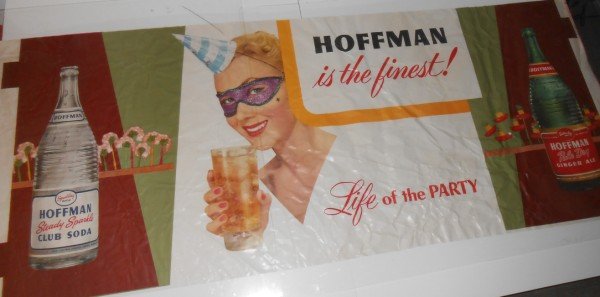 ADVERTISING POSTER: LARGE HOFFMAN CLUB SODA/GINGER ALE ADVERTISING POSTER. CREASES TEAR. 68 INCHES X 27 1/2 INCHES.