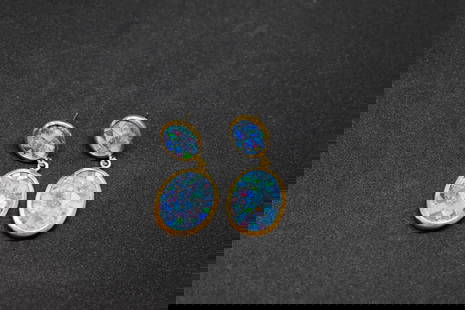 14k Australian Opel Earrings: 14k Australian Opal Earrings. weighs 6.6 grams
