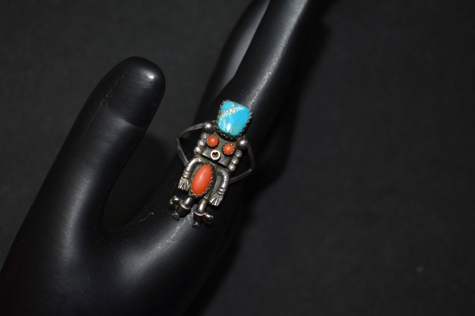 Sterling Silver Native American Ring: Sterling Silver Native American Ring. Turquoise and coral inlay with stamps inside "M arrow M". Size 5.25